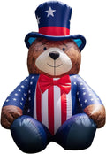 Brown teddy bear inflatable in a stars-and-stripes top hat and jacket with a red bow tie
