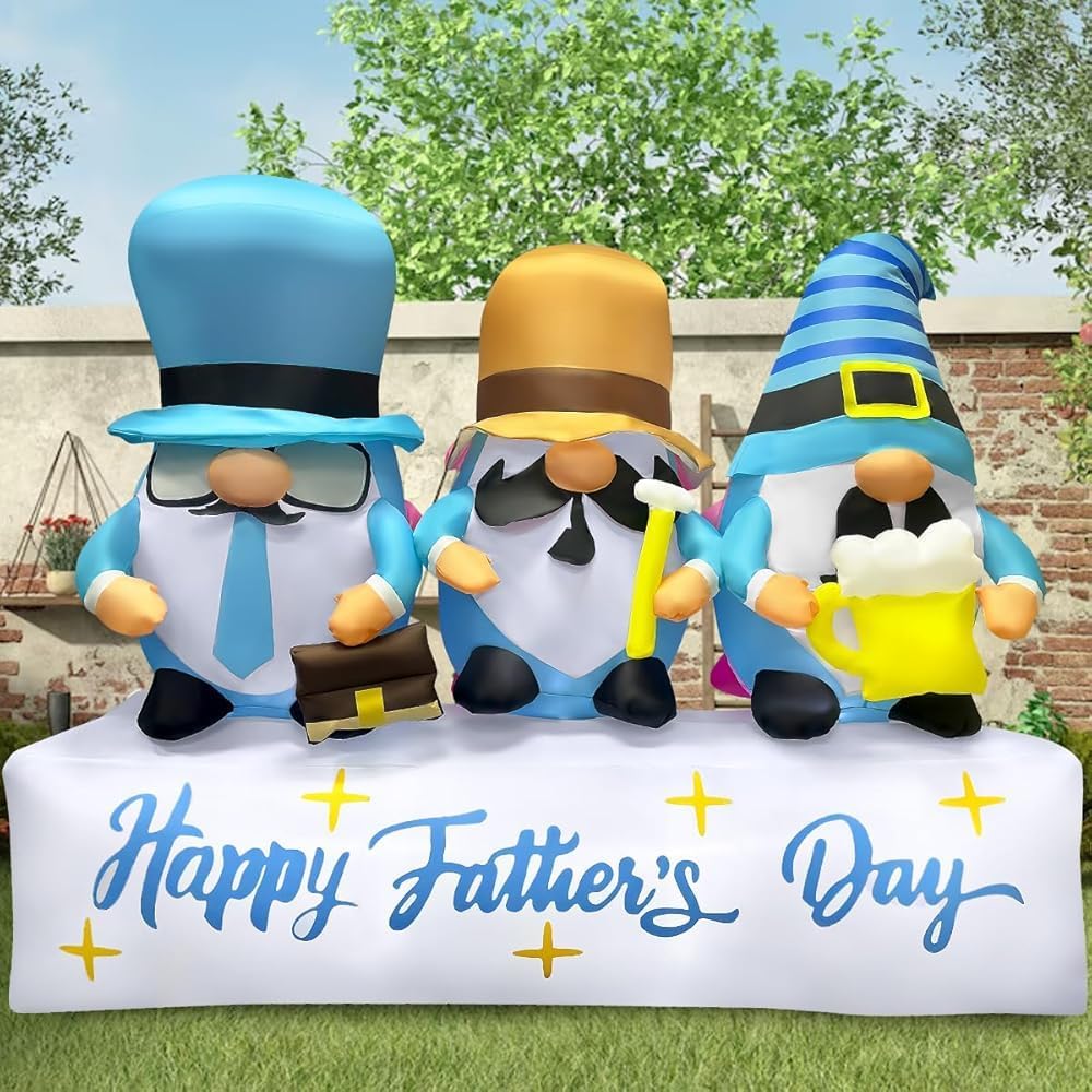 Three gnome inflatables in hats with mustaches on a Happy Father's Day base in a garden