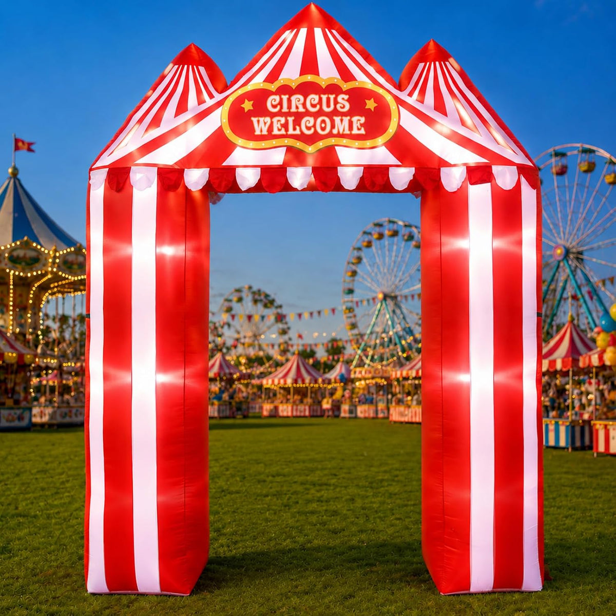 Red and white striped circus tent arch inflatable with a Circus Welcome sign at a carnival