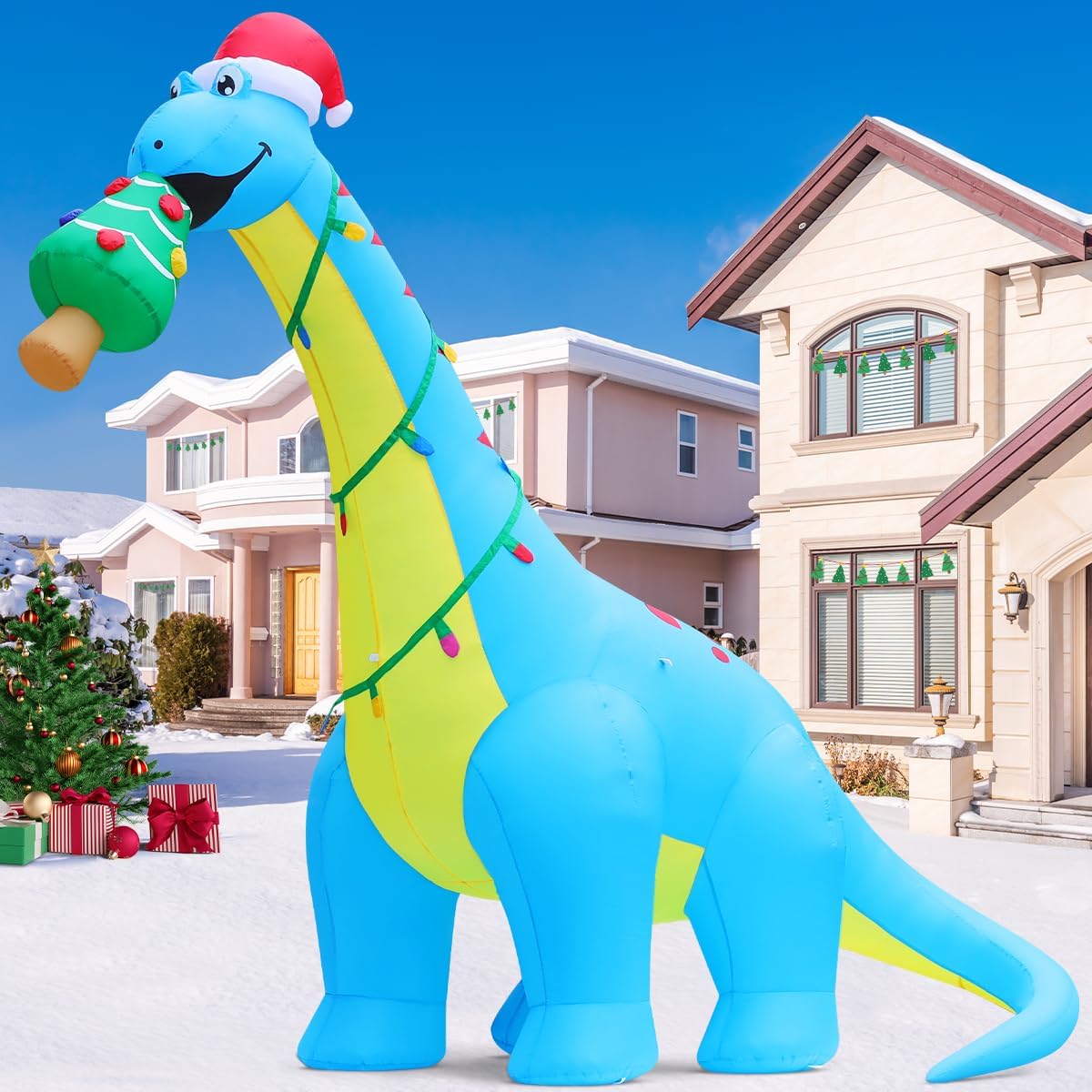 Blue long-neck dinosaur inflatable in a Santa hat wrapped in colored lights carrying a small tree