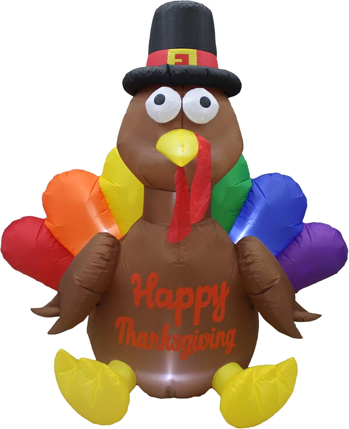 Brown turkey inflatable in a pilgrim hat with rainbow tail feathers and Happy Thanksgiving on its belly