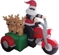 Santa in sunglasses on a red motorcycle with three reindeer in a green sidecar