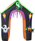 Black haunted house arch inflatable with a green roof, a ghost, a witch and a spider