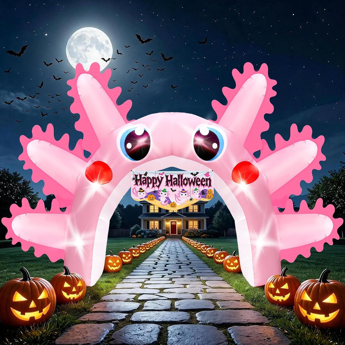 Giant pink axolotl arch inflatable with a Happy Halloween sign over a stone path with pumpkins